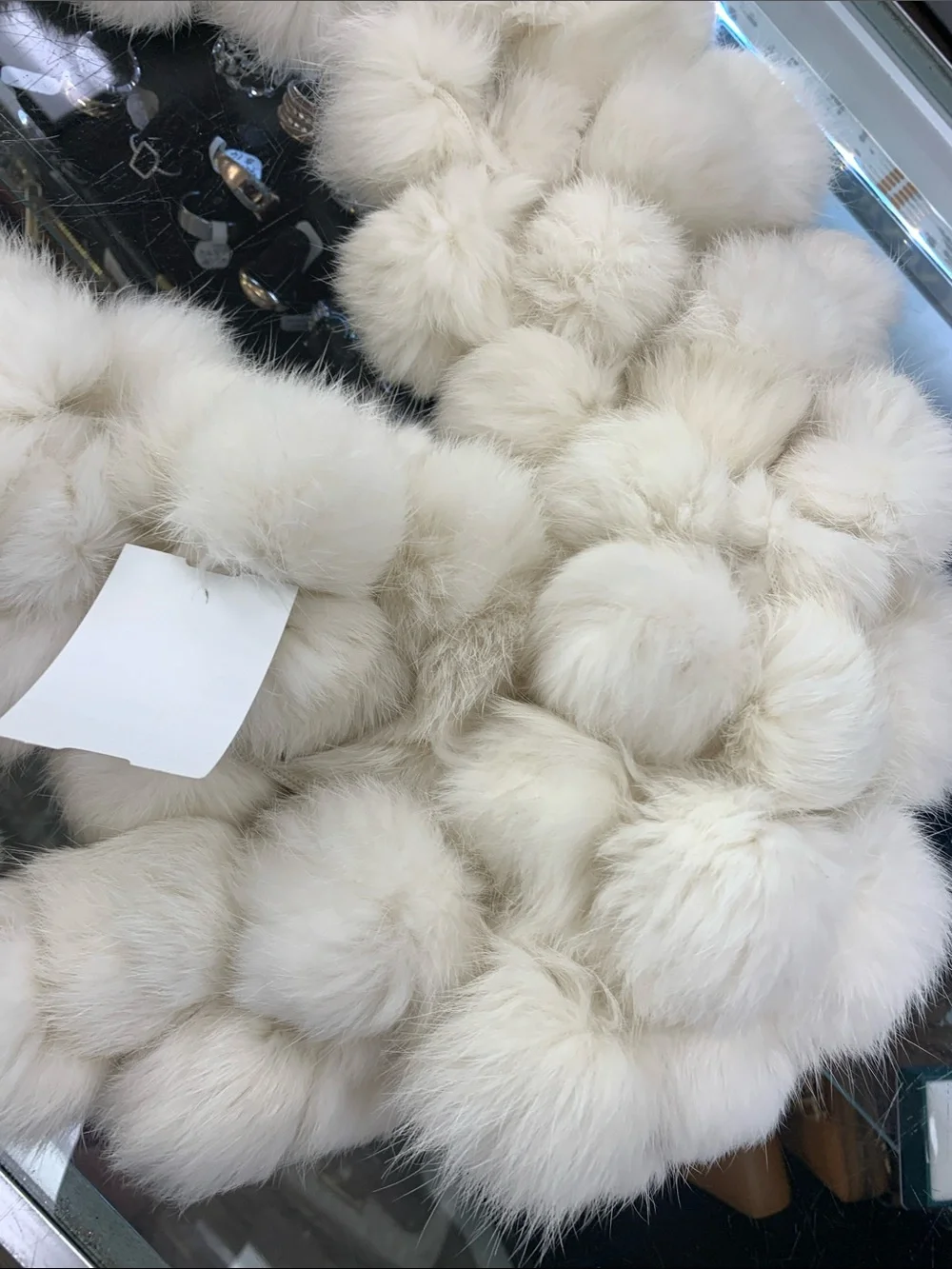Home Accents Faux Fur Pom-Pom Scarf in Cream